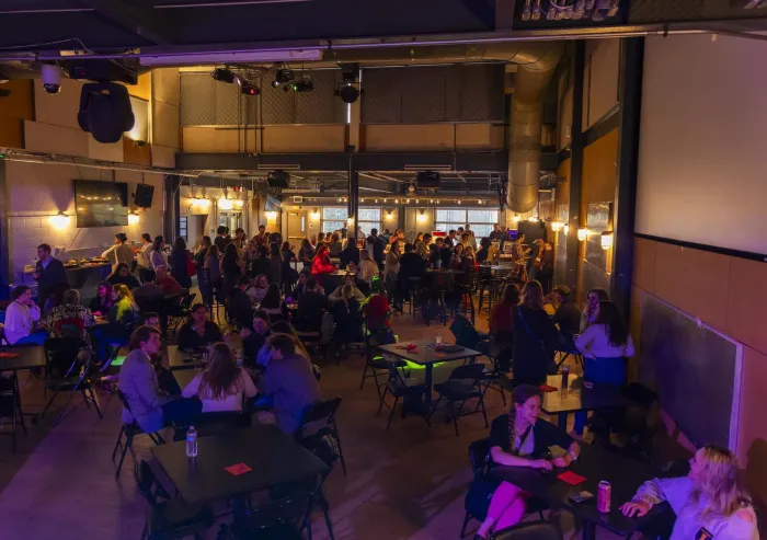 Patrons enjoying an event at the Attic.