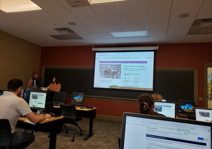 A group of people in class for Employee Enrichment Day