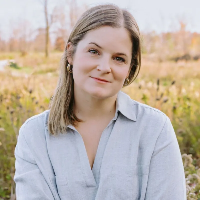 woman smiles at camera