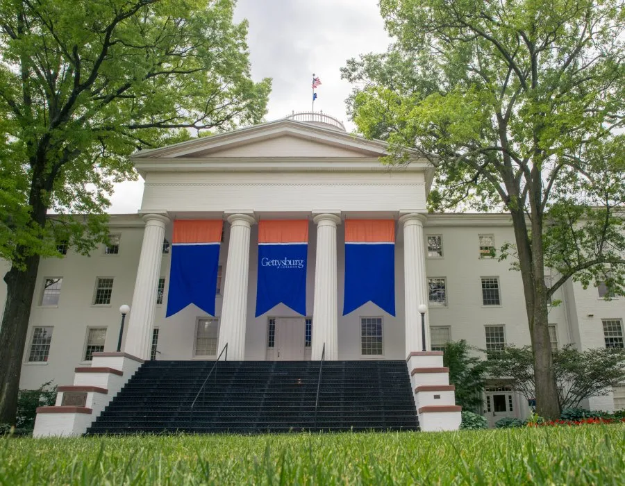 Gettysburg College banners hang in Penn Hall portico