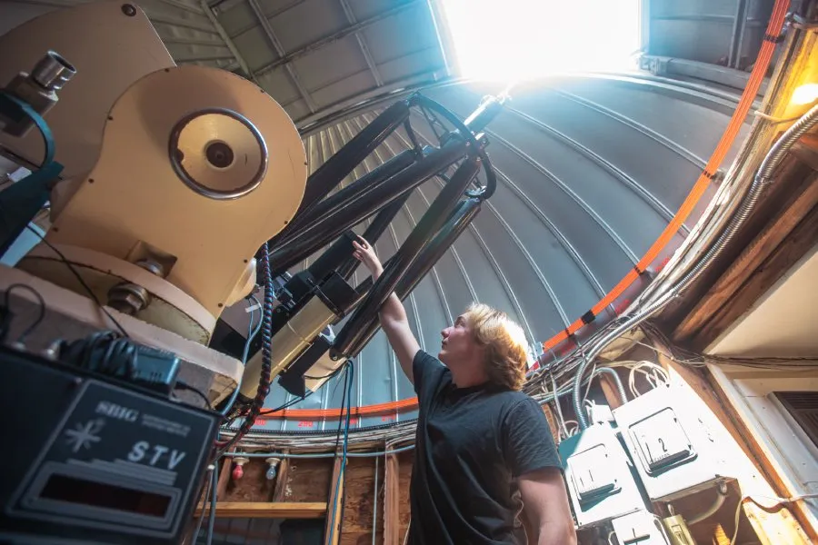 student works in observatory