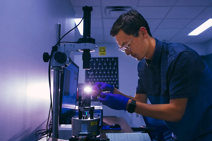 A student in the lab doing an experiment