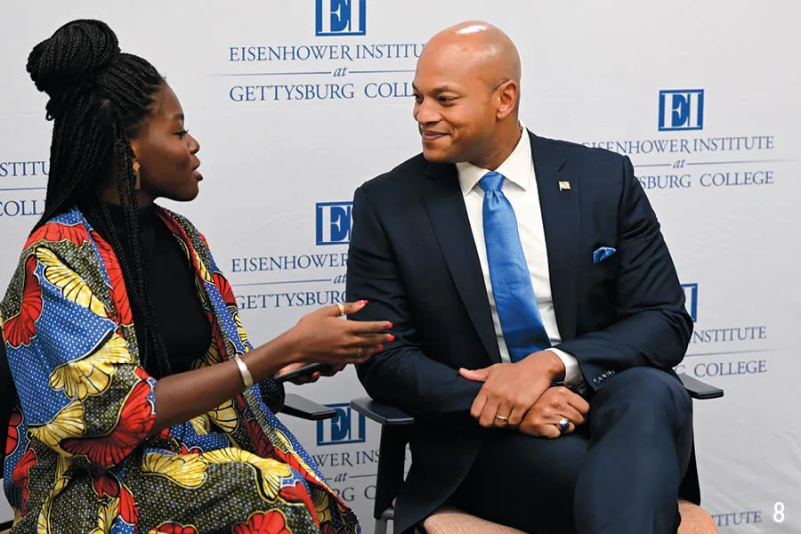 female student speaks with MD governor Wes Moore at Eisenhower Institute