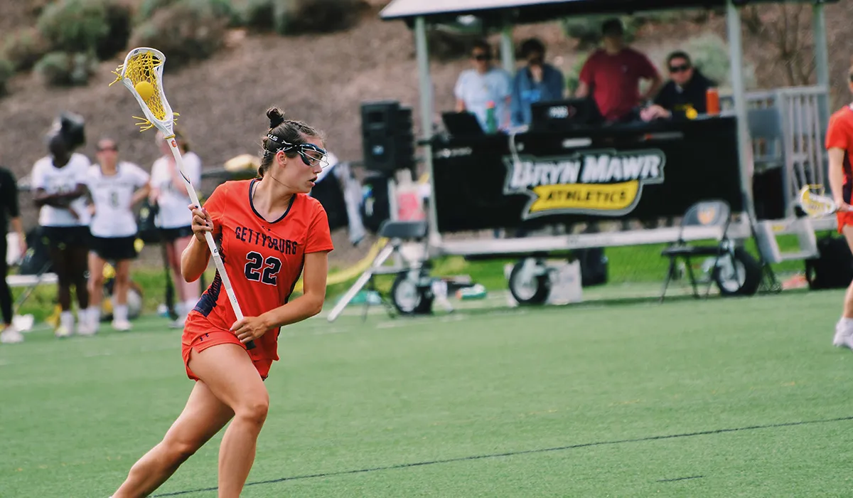 Regan Rightmire playing lacrosse