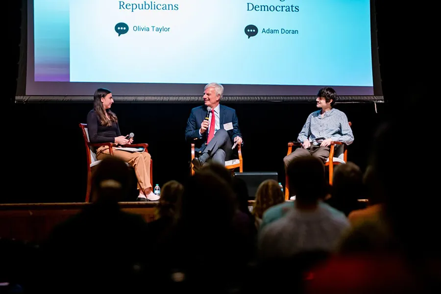 Taylor (left) and Doran (right) moderate a Q&A with Canellos.