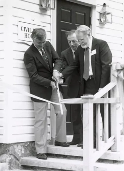 President Gordon Haaland cutting the ceremonial opening ribbon.