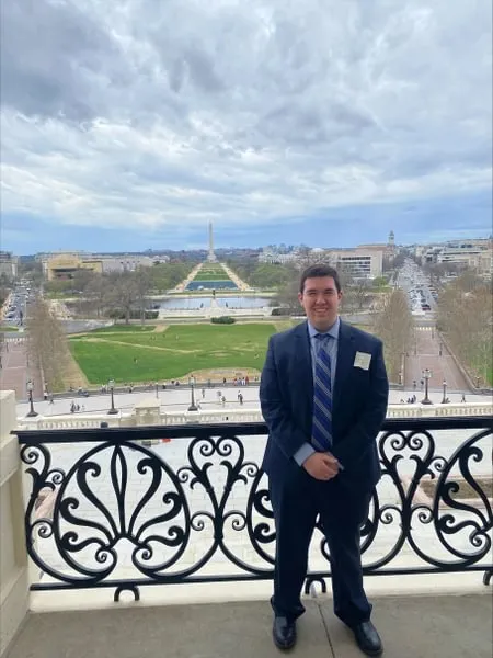 Michael Woods ’25 on the Speaker’s Balcony during an Eisenhower trip.
