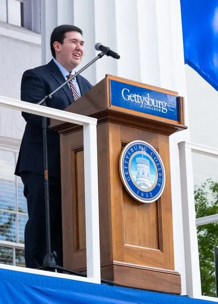 Michael Woods ’25 welcomes the Class of 2028 at Opening Convocation.