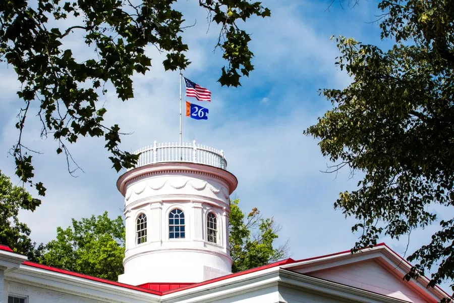 The Penn Hall Cupola with the Class of 2026 flag.