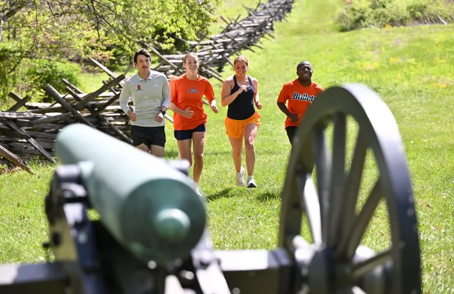 Students enjoy a run through Gettysburg National Military Park.