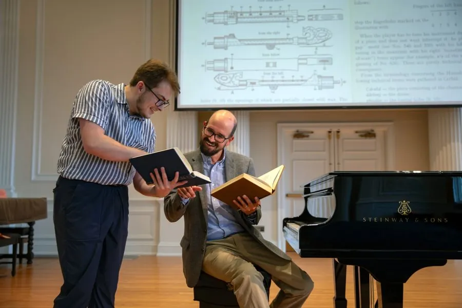 Aris Corman-O’Reilly ’27 and Prof. William O’Hara analyze music by Béla Bartók.