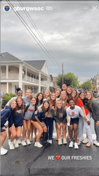 Members of Gettysburg’s women’s soccer team greet the Class of 2027 during the First-Year Walk in August 2023.