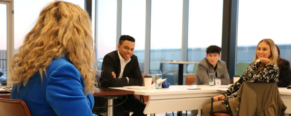Students listening to a presentation