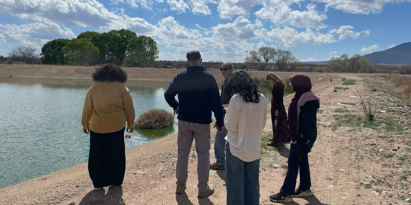 Students looking at a water source in Bisbee, Arizona.