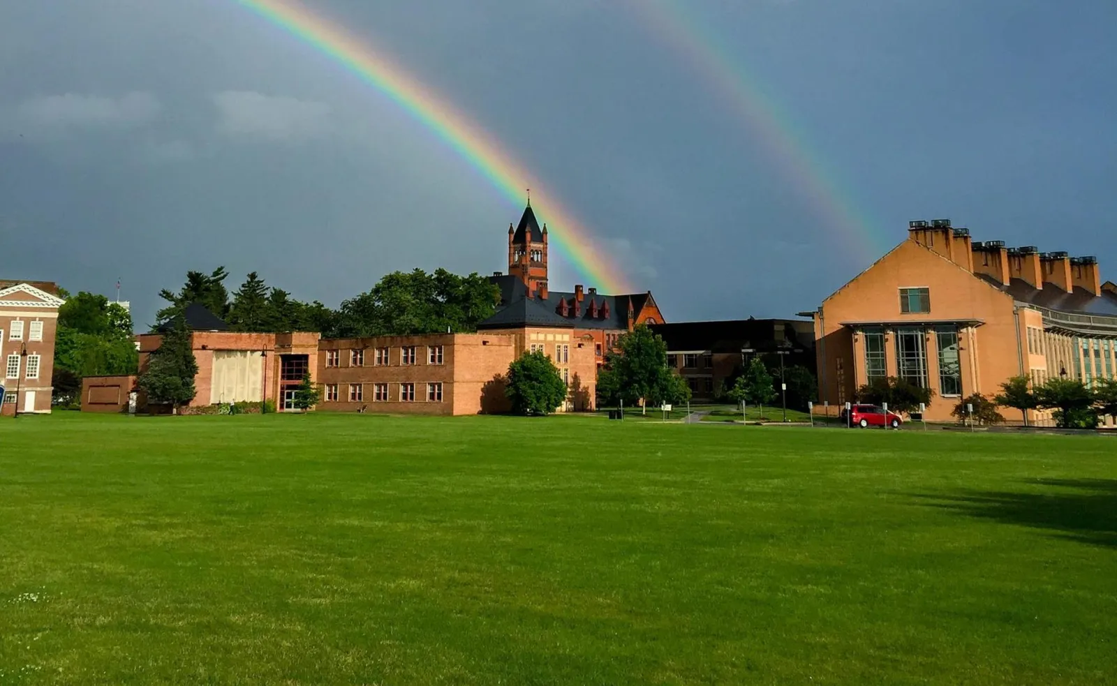 A double rainbow across the sky behind Memorial Field.