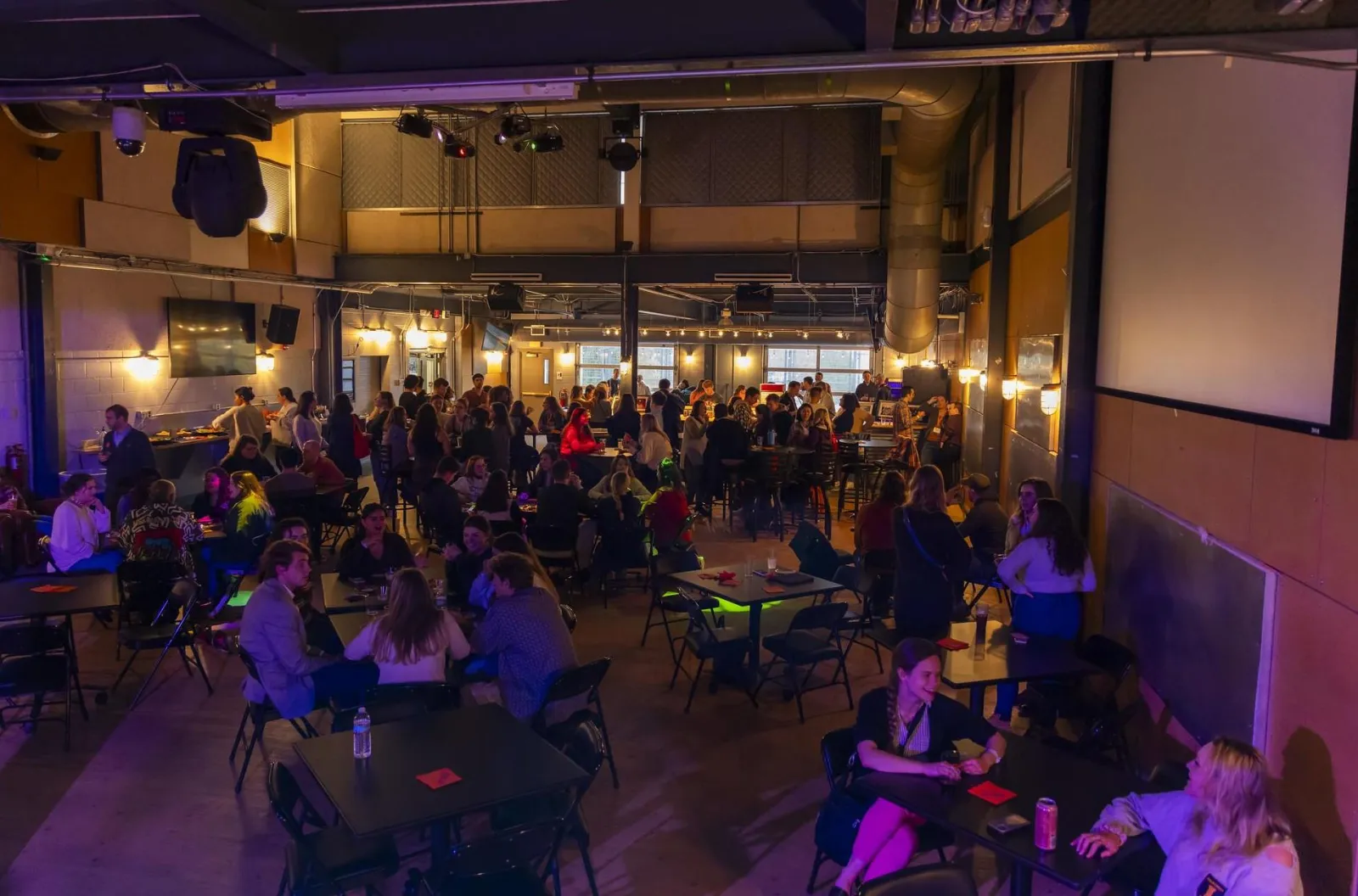Patrons enjoying an event at the Attic.
