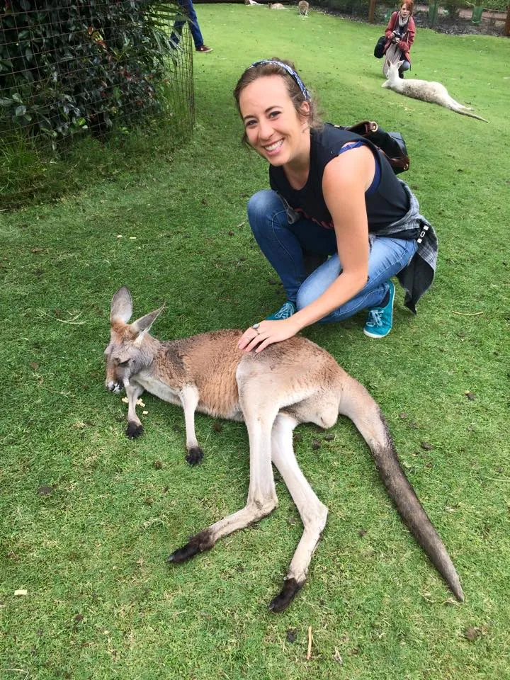 student pets kangaroo