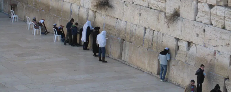 People praying at the Western Wall in Jerusalem.