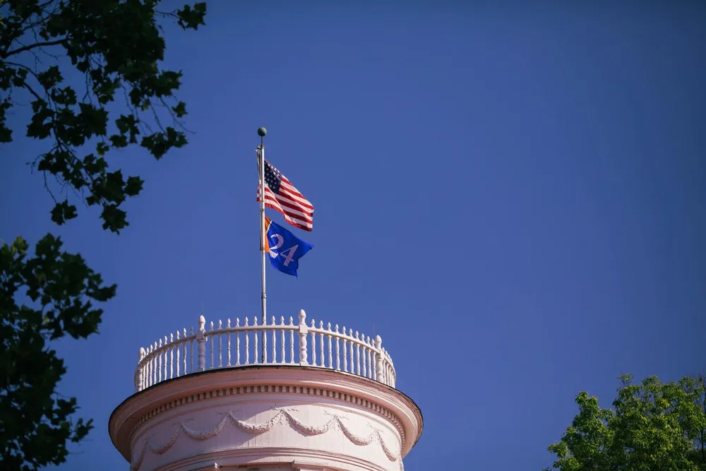 The American and Gettysburg College flags above Pennsylvania Hall.