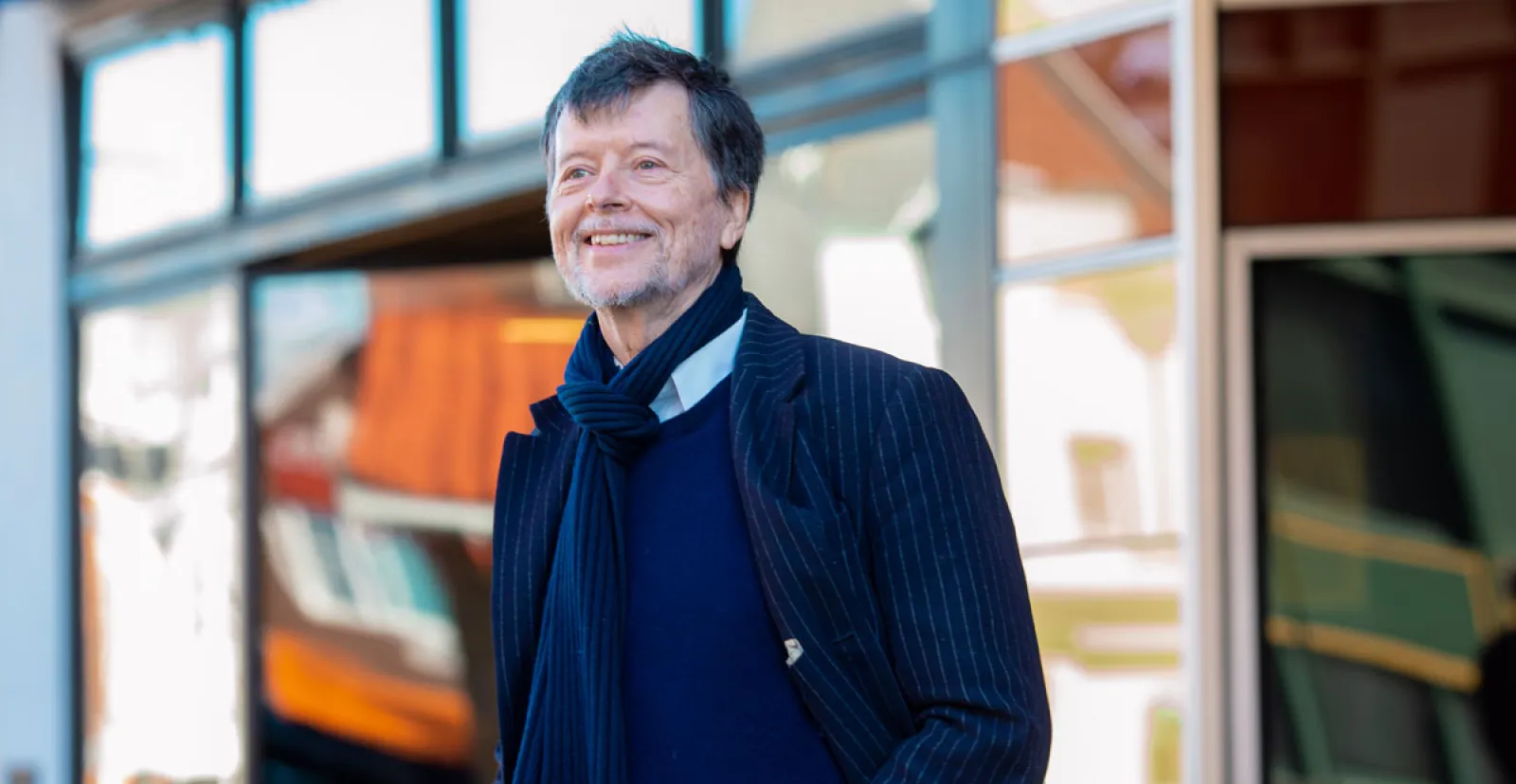 Ken Burns poses and smiles