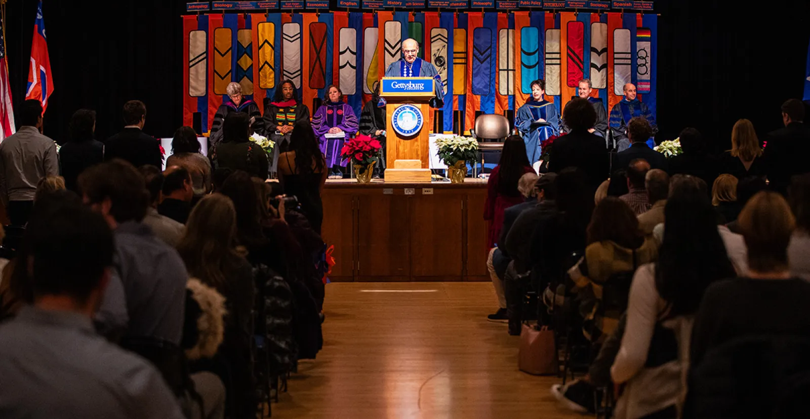 President Bob Iuliano speaking at the Midyear Graduation Ceremony