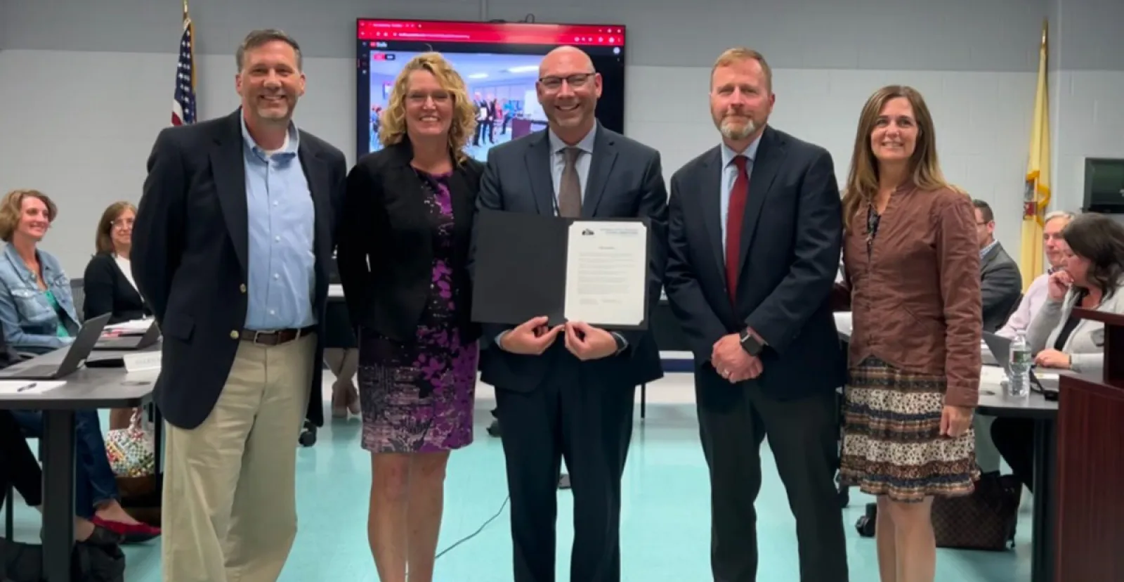 Hart at a school board meeting after receiving his award.
