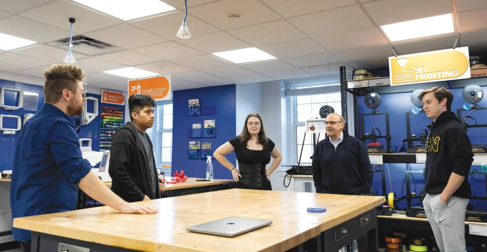 Gettysburg College President Bob Iuliano meets with students in the Rogers Center for Innovation and Creativity.