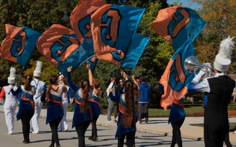 Bullets Marching Band outside in fall parade