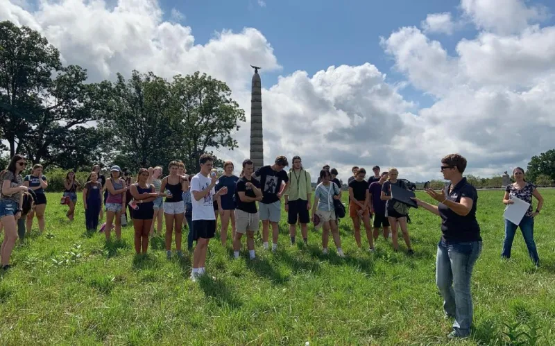 Jill Ogline Titus leads Lincoln Scholars at Gettysburg National Military Park.